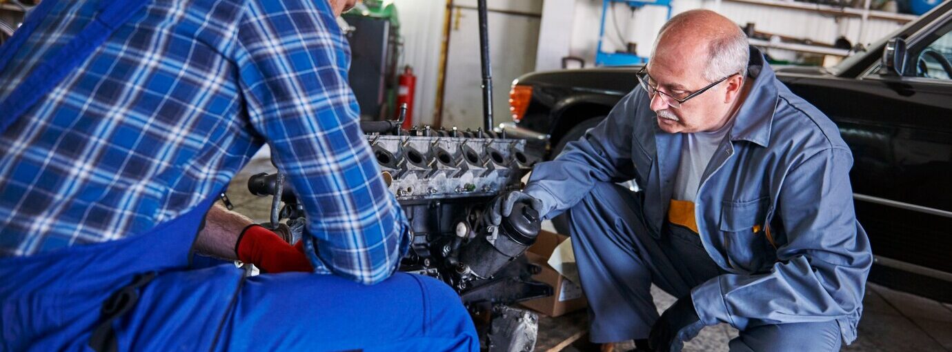 mechanics repairing car workshop_329181 11837 e1732778267987